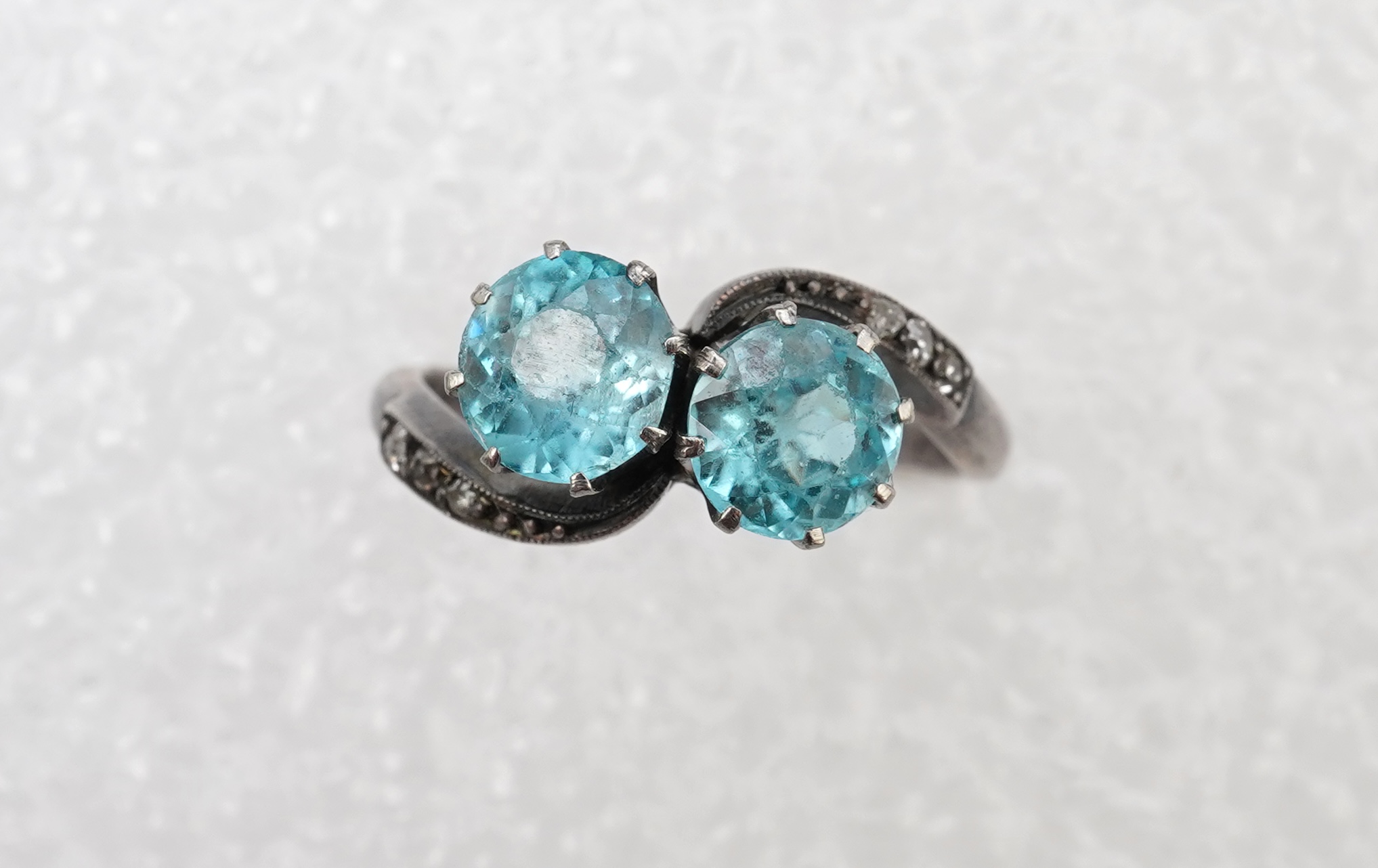 A zircon and diamond 'toi-et-moi' ring